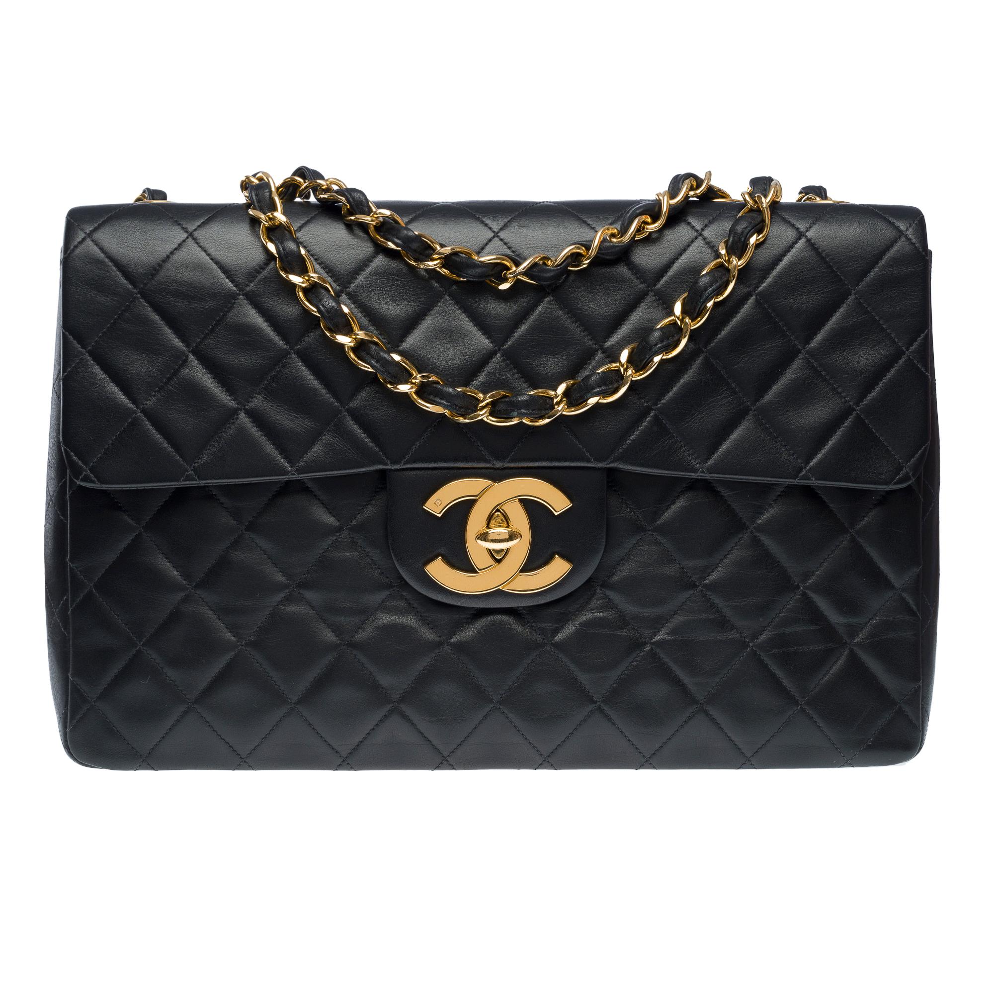 Black Chanel Timeless Maxi Jumbo flap shoulder bag in black quilted lambskin, GHW For Sale