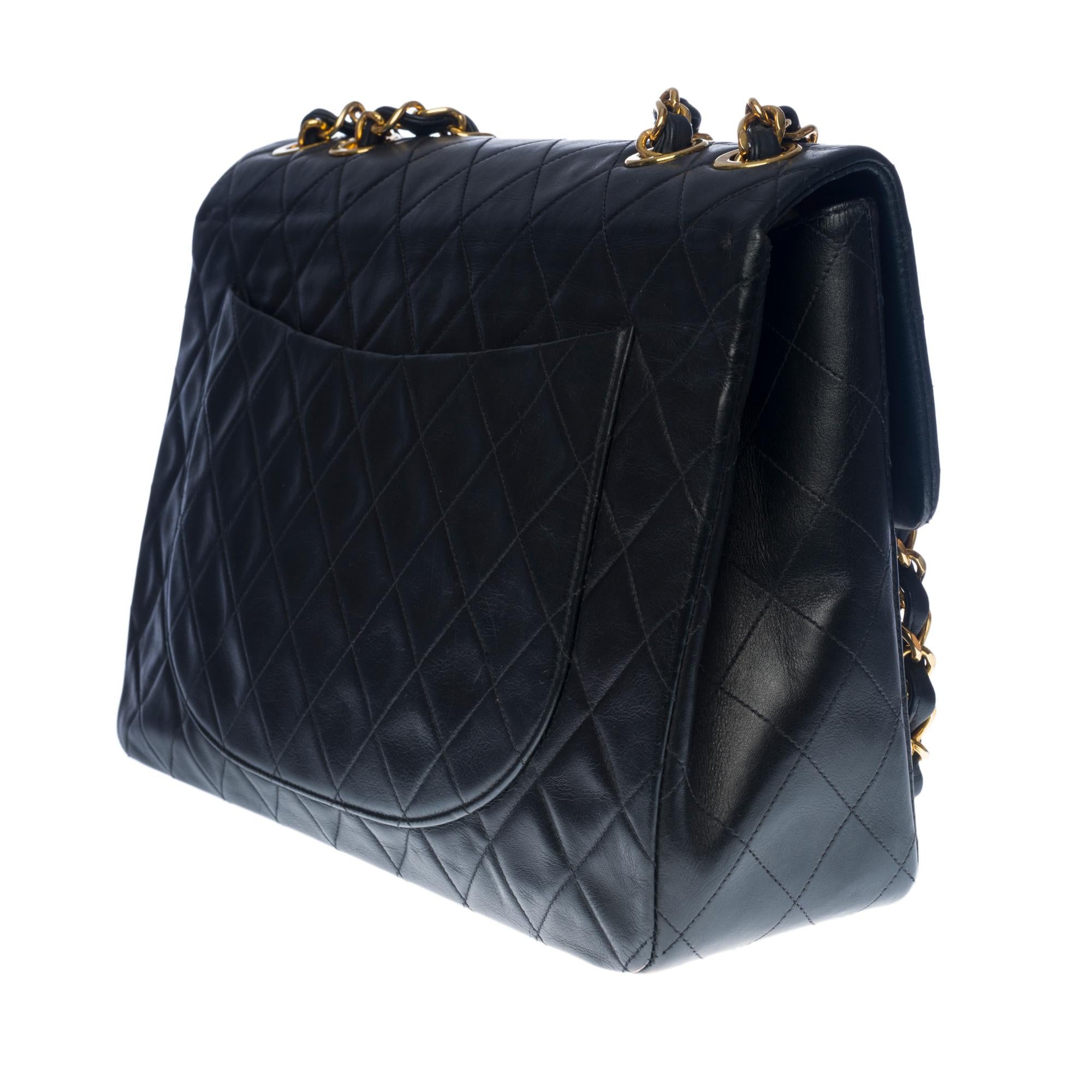 Black Chanel Timeless Maxi Jumbo flap shoulder bag in black quilted lambskin, GHW