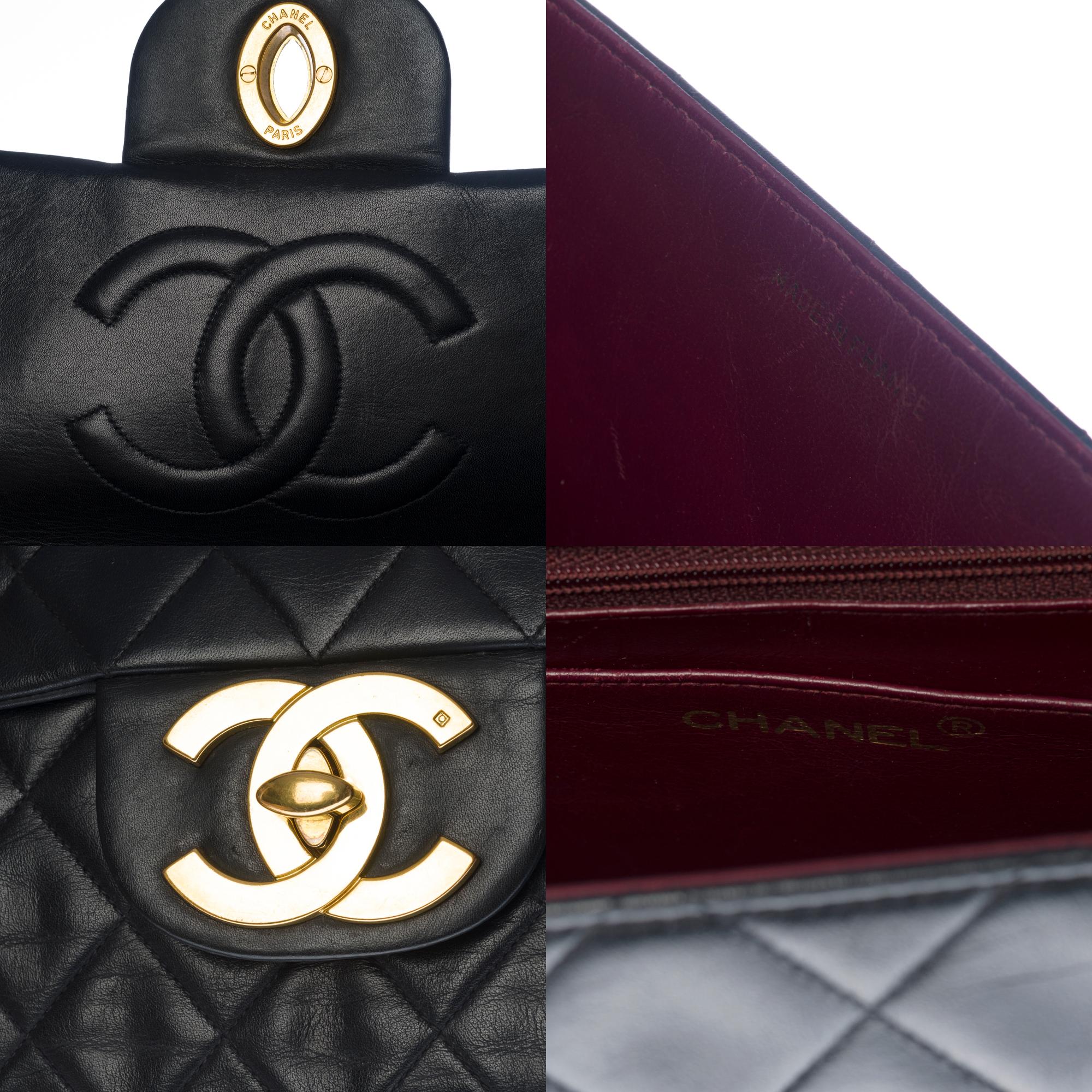 Chanel Timeless Maxi Jumbo flap shoulder bag in black quilted lambskin, GHW In Good Condition In Paris, IDF