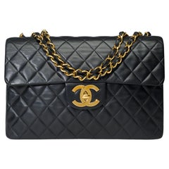 Chanel Timeless Maxi Jumbo flap shoulder bag in black quilted lambskin, GHW