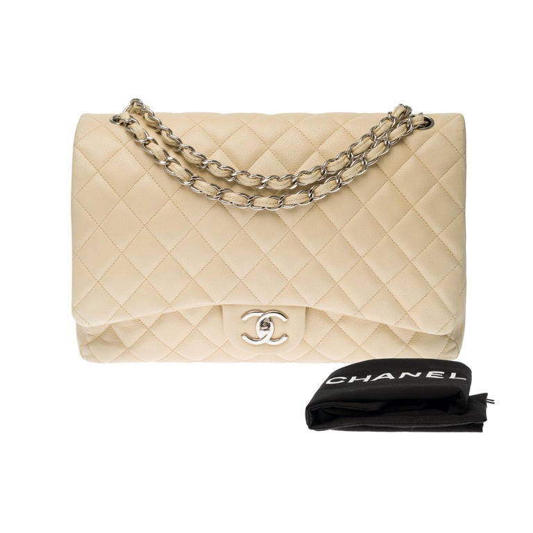 Chanel Timeless Maxi Jumbo shoulder bag in beige quilted caviar leather, SHW  at 1stDibs