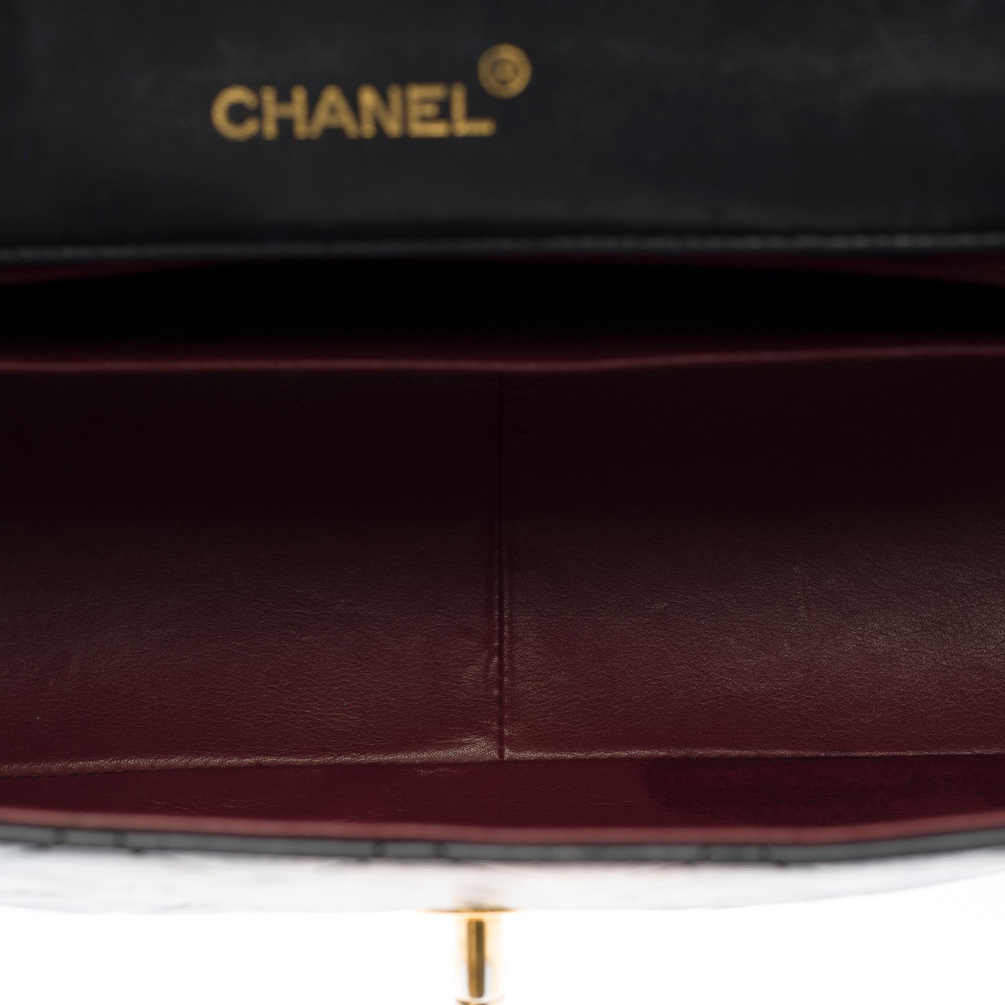Chanel Timeless Maxi Jumbo single flap handbag in black quilted lambskin, GHW 1