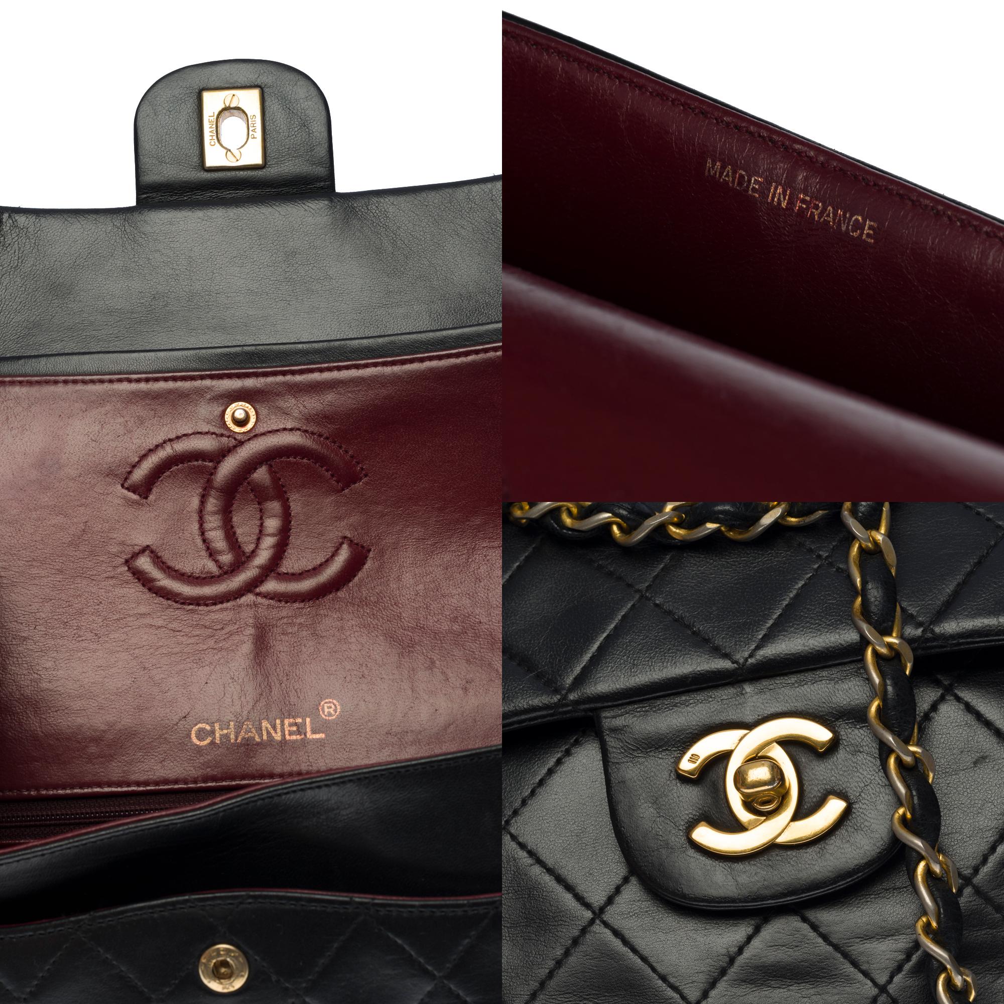 Chanel Timeless medium 25 cm bag with double flap in black quilted leather, GHW For Sale 1