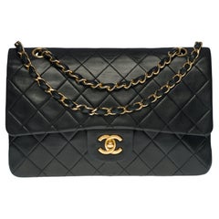 Chanel Timeless medium 25 cm bag with double flap in black quilted leather, GHW