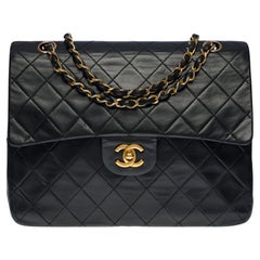 Chanel Timeless Medium 25 cm Tasche mit doppelter Klappe aus schwarzem gestepptem Leder,GHW