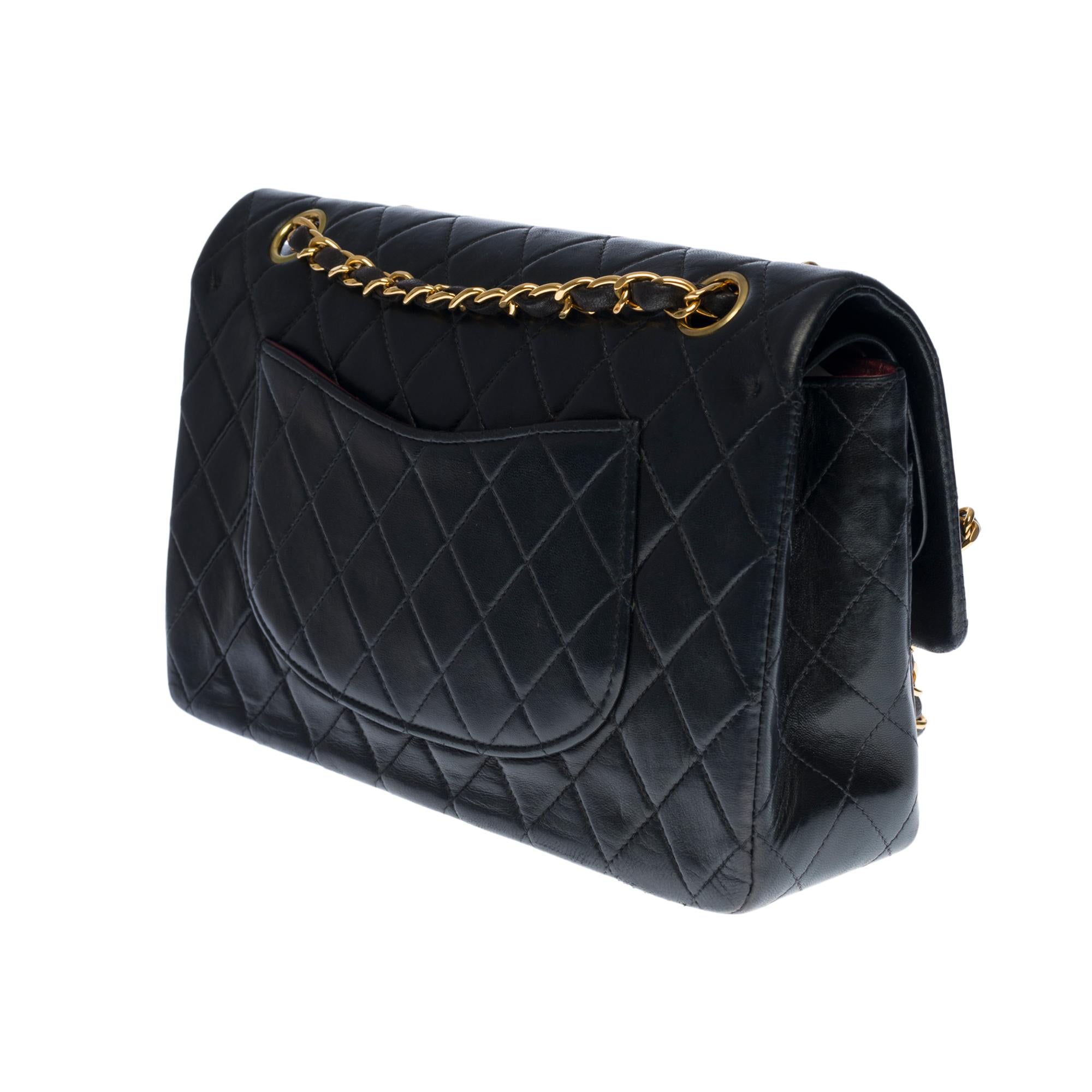 Chanel Timeless Medium double flap Shoulder bag in black quilted lambskin, GHW In Good Condition In Paris, IDF