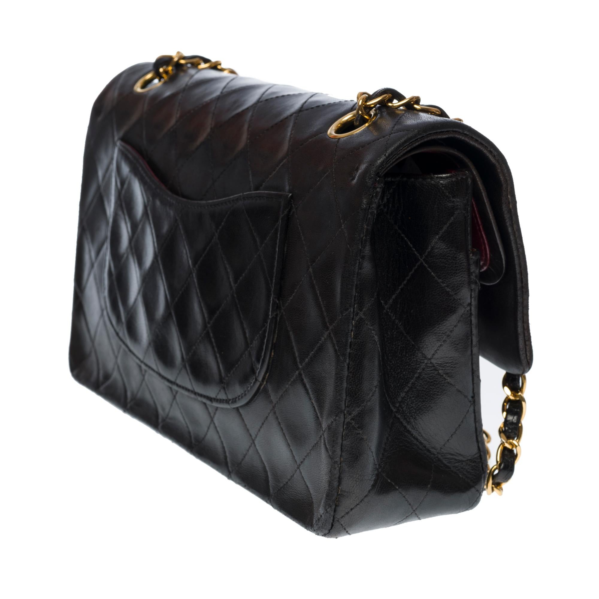 Women's Chanel Timeless Medium double flap shoulder bag in black quilted lambskin , GHW