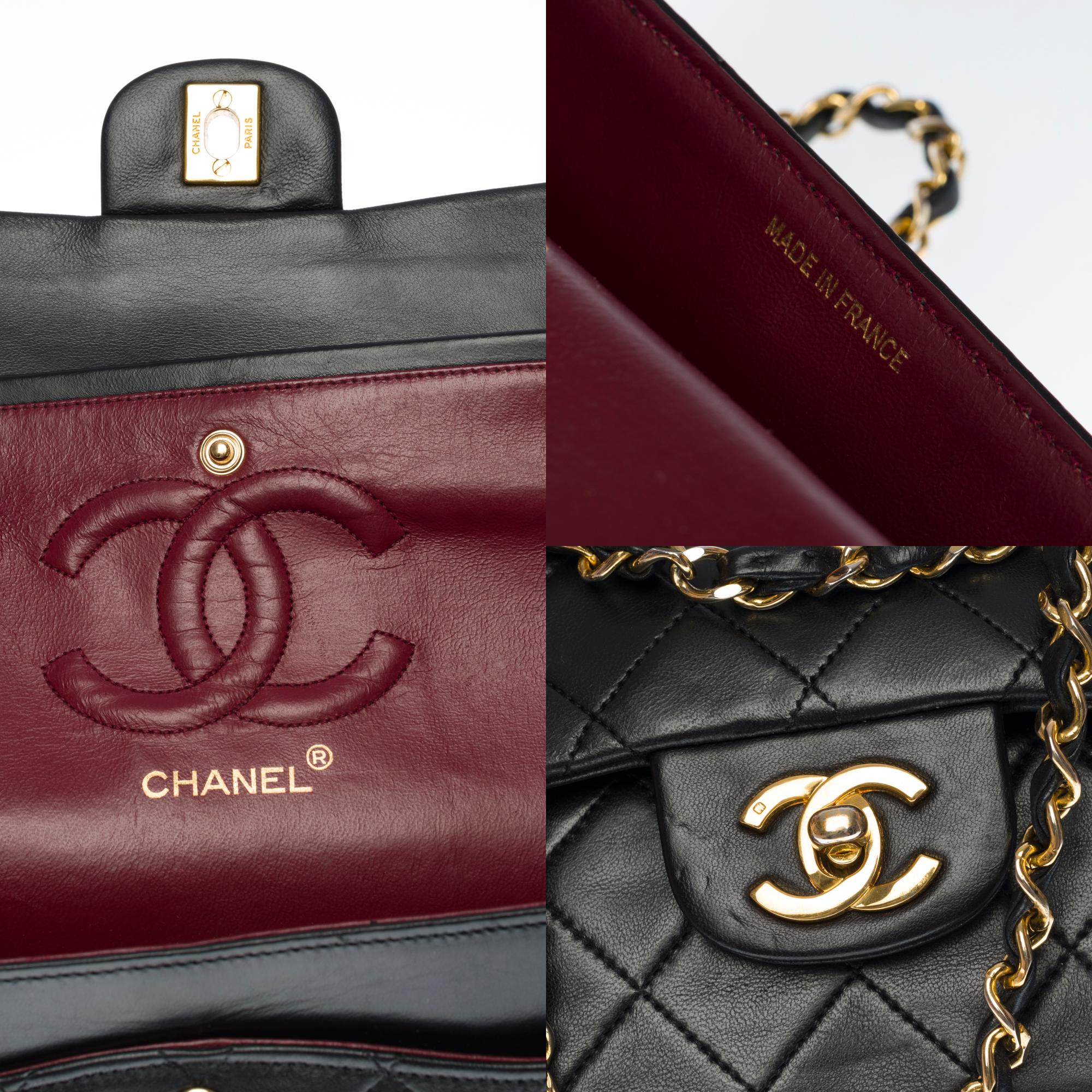 Women's Chanel Timeless Medium double flap shoulder bag in black quilted lambskin, GHW