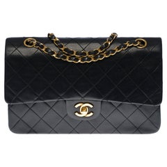 Chanel Timeless Medium double flap Shoulder bag in black quilted lambskin, GHW