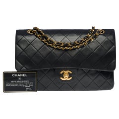 Chanel Timeless Medium double flap shoulder bag in black quilted lambskin , GHW