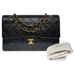 Chanel Timeless Medium double flap shoulder bag in black quilted leather, GHW