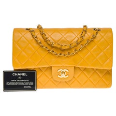 Chanel Timeless Medium double flap shoulder bag in Yellow quilted lambskin , GHW