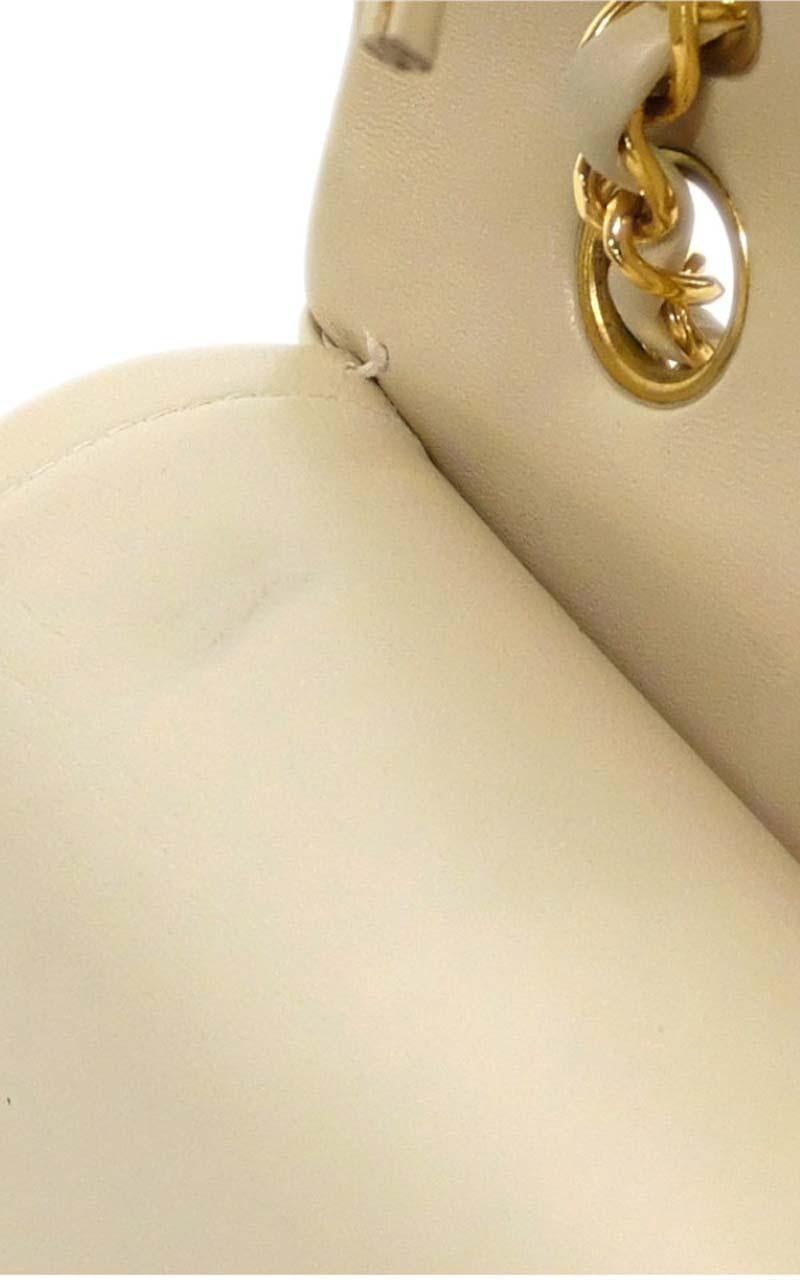 Chanel Timeless medium handbag in Ivory quilted leather and gold hardware 2