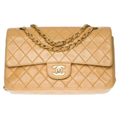 Chanel Timeless Medium Shoulder bag in beige quilted leather and gold hardware