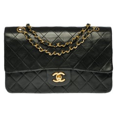Chanel Timeless Medium Shoulder bag in black quilted lambskin and gold hardware