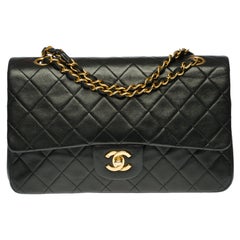 Chanel Timeless Medium Shoulder bag in black quilted lambskin and gold hardware