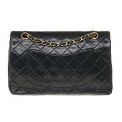 Chanel Timeless Medium Shoulder bag in black quilted leather and gold hardware