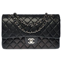 Chanel Timeless Medium Shoulder bag in black quilted leather and silver hardware