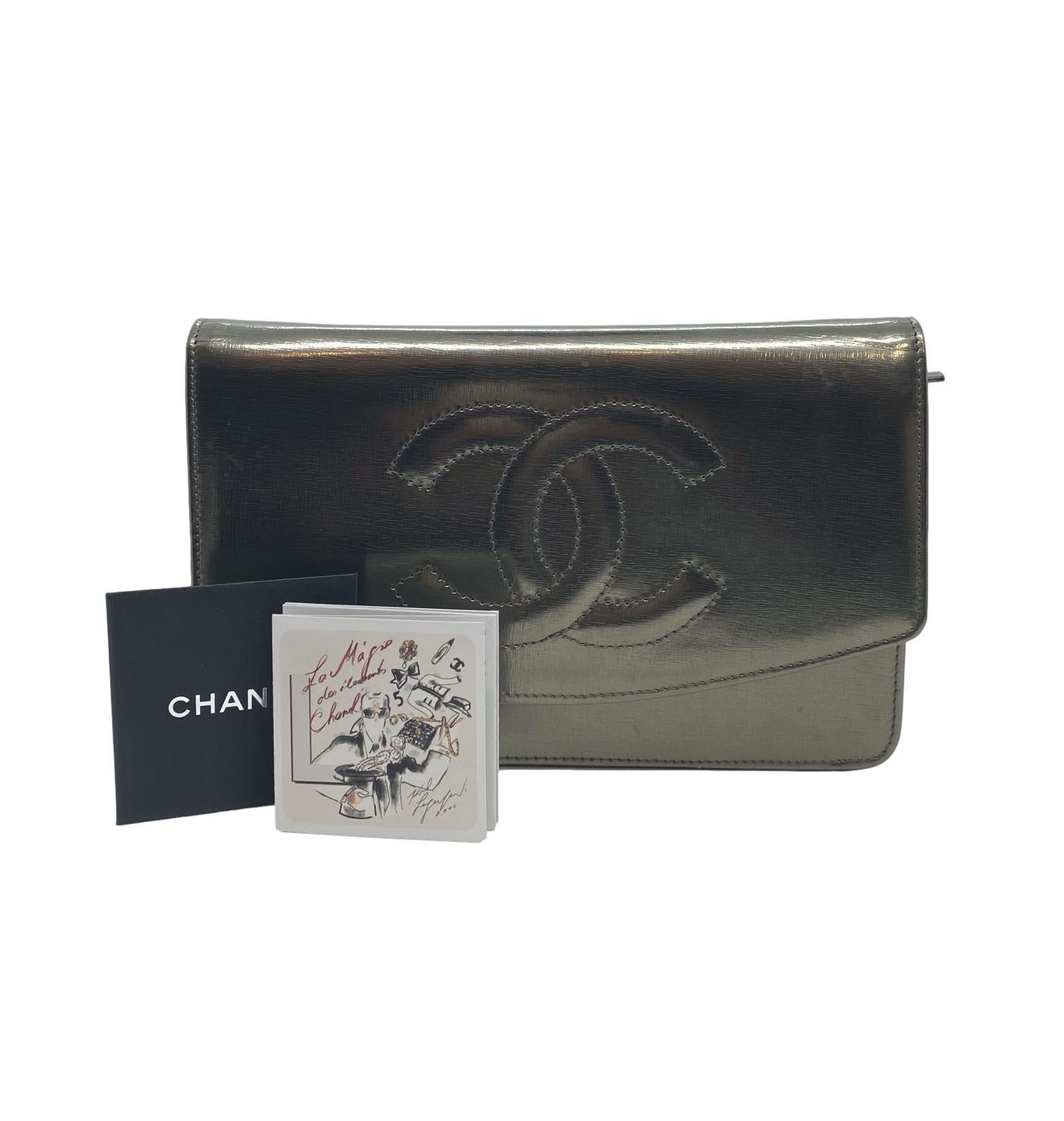 Chanel Timeless Metallic Leather Wallet on Chain Shoulder Clutch Bag with Palladium Hardware. Exceptionally made, this highly sought after and popular piece was produced between 2008 - 2009 under the direction of Karl Lagerfield baring a serial code