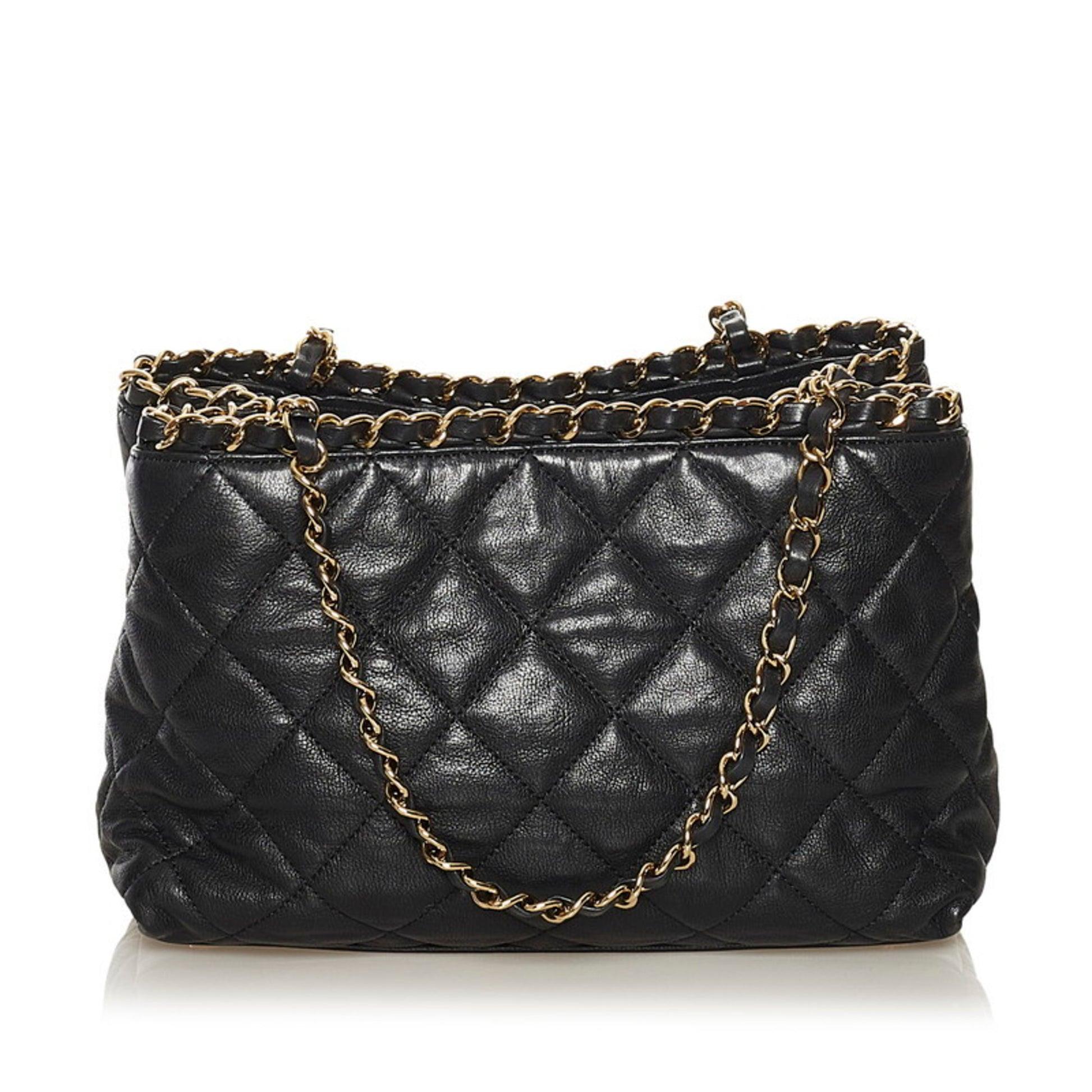 Women's or Men's Chanel Timeless Mini Chain Around Shopper Caviar Gst Gold Hardware Black Bag For Sale