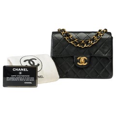 Chanel Timeless Mini shoulder Flap bag in black quilted lambskin leather , GHW