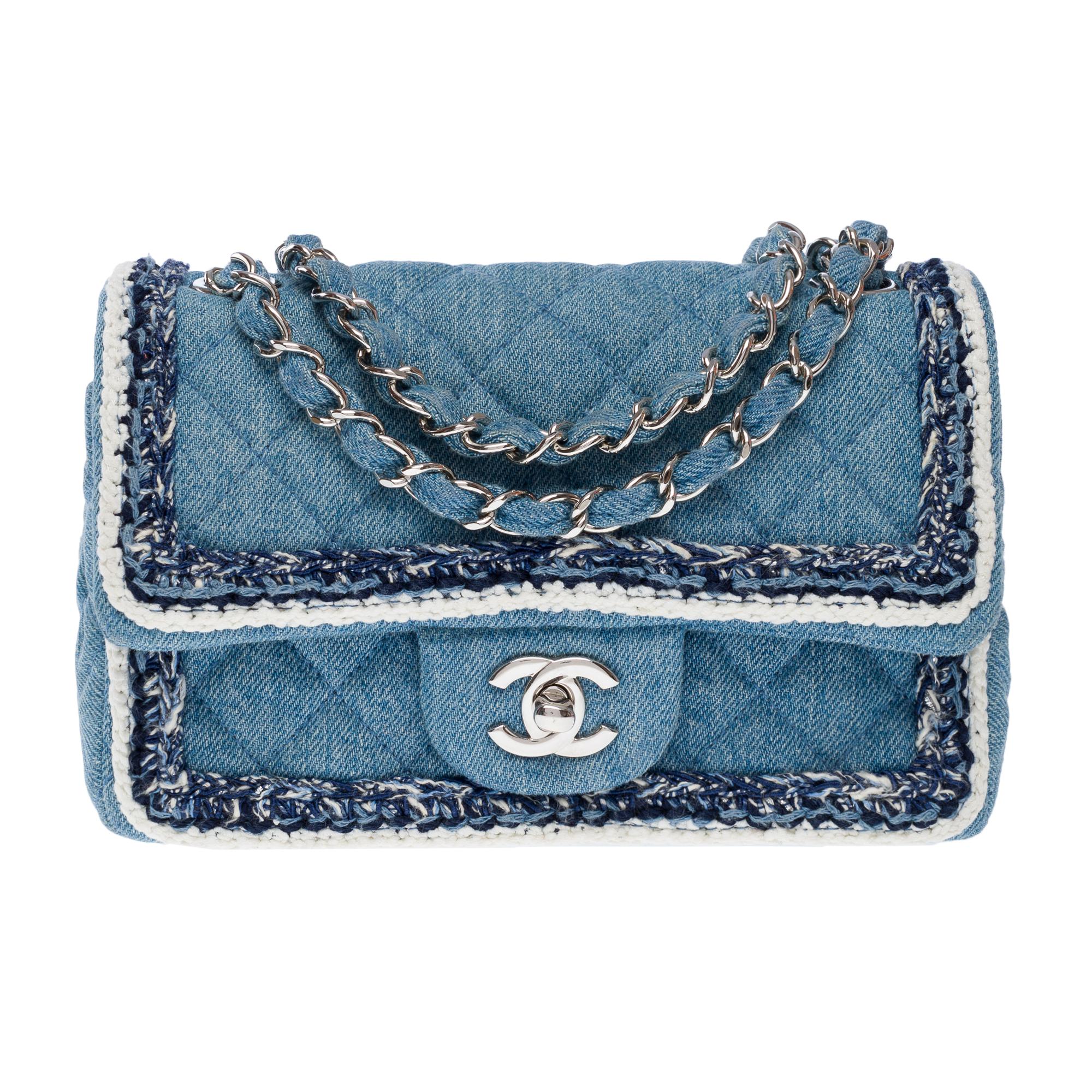 Stunning​ ​limited​ ​edition​ ​Chanel​ ​Timeless​ ​Mini​ ​shoulder​ ​flap​ ​bag​ ​in​ ​denim​ ​with​ ​braided​ ​tweed​ ​edging,​ ​silver​ ​metal​ ​trim,​ ​silver​ ​metal​ ​interwoven​ ​denim​ ​chain​ ​handle​ ​allowing​ ​for​ ​hand,​ ​shoulder,​