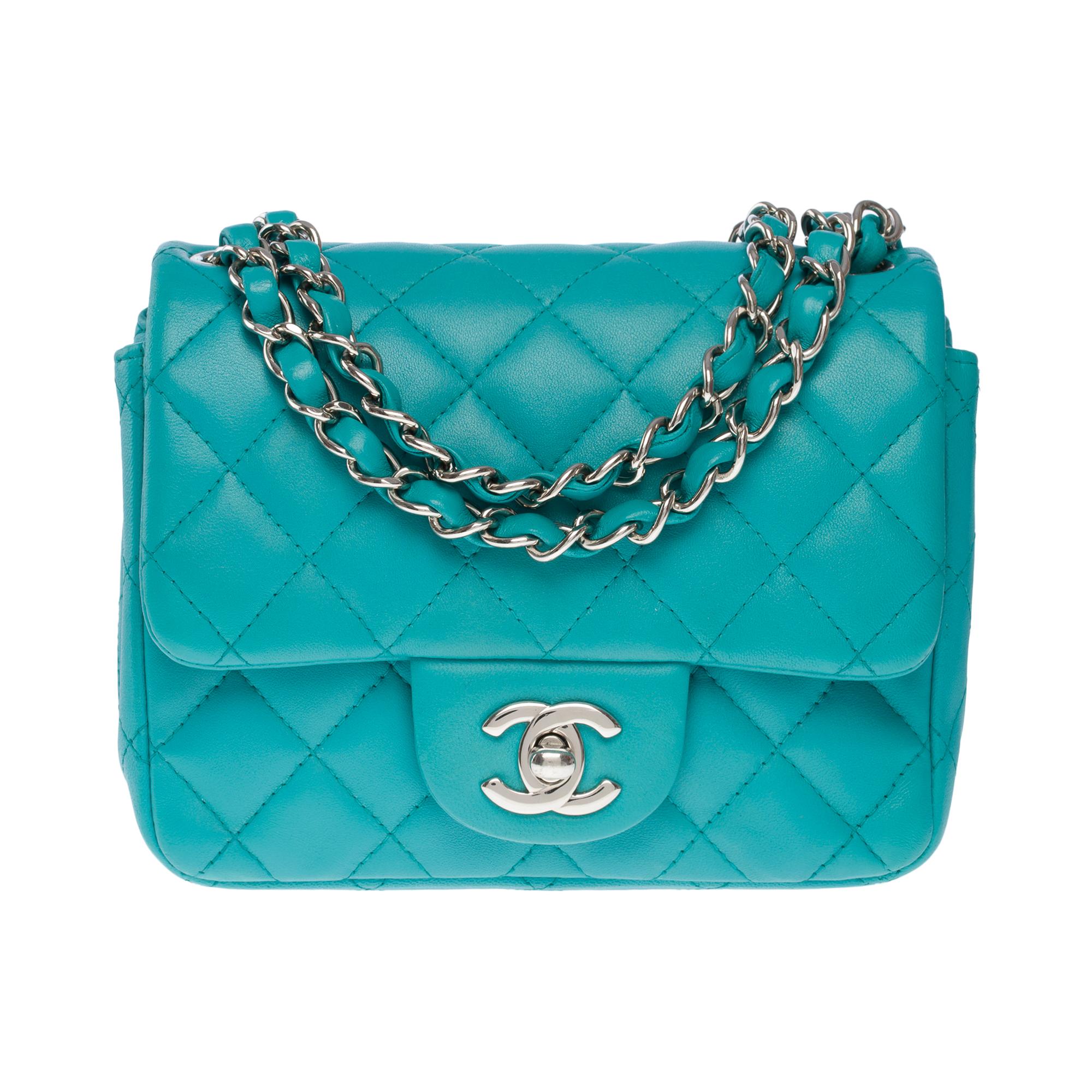 Superb​ ​Chanel​ ​Mini​ ​Timeless​ ​single​ ​shoulder​ ​flap​ ​bag​ ​in​ ​vert​ ​d'eau​ (water green) ​quilted​ ​lambskin​ ​leather,​ ​silver​ ​metal​ ​trim,​ ​a​ ​silver​ ​metal​ ​chain​ ​interlaced​ ​with​ ​green​ ​leather​ ​allowing​ ​a​