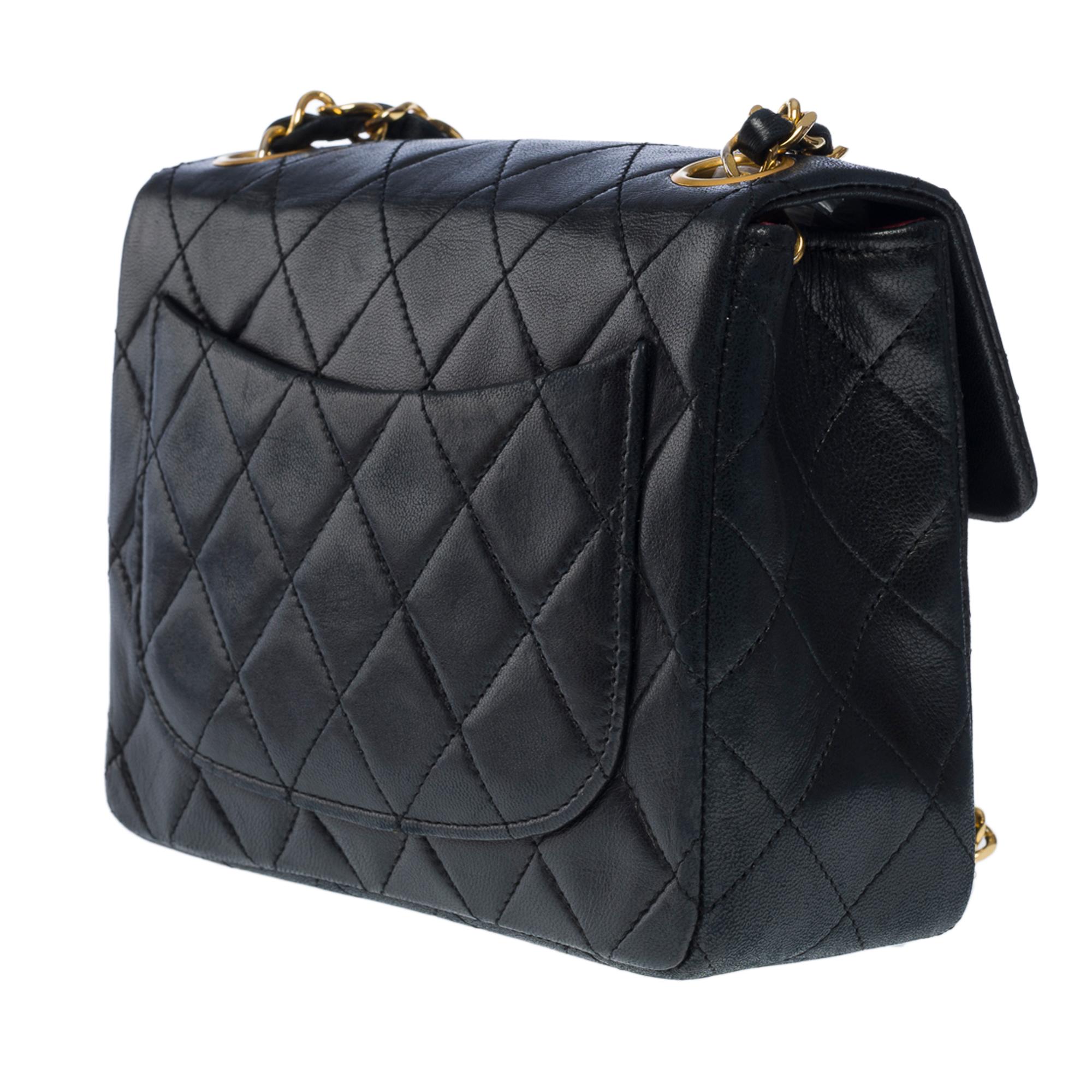 Women's Chanel Timeless Mini Square shoulder Flap bag in black quilted lambskin, GHW