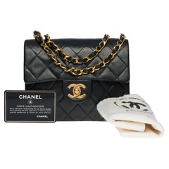 Chanel Timeless Mini Square Schultertasche mit Klappe aus schwarzem, gestepptem Lammleder, GHW