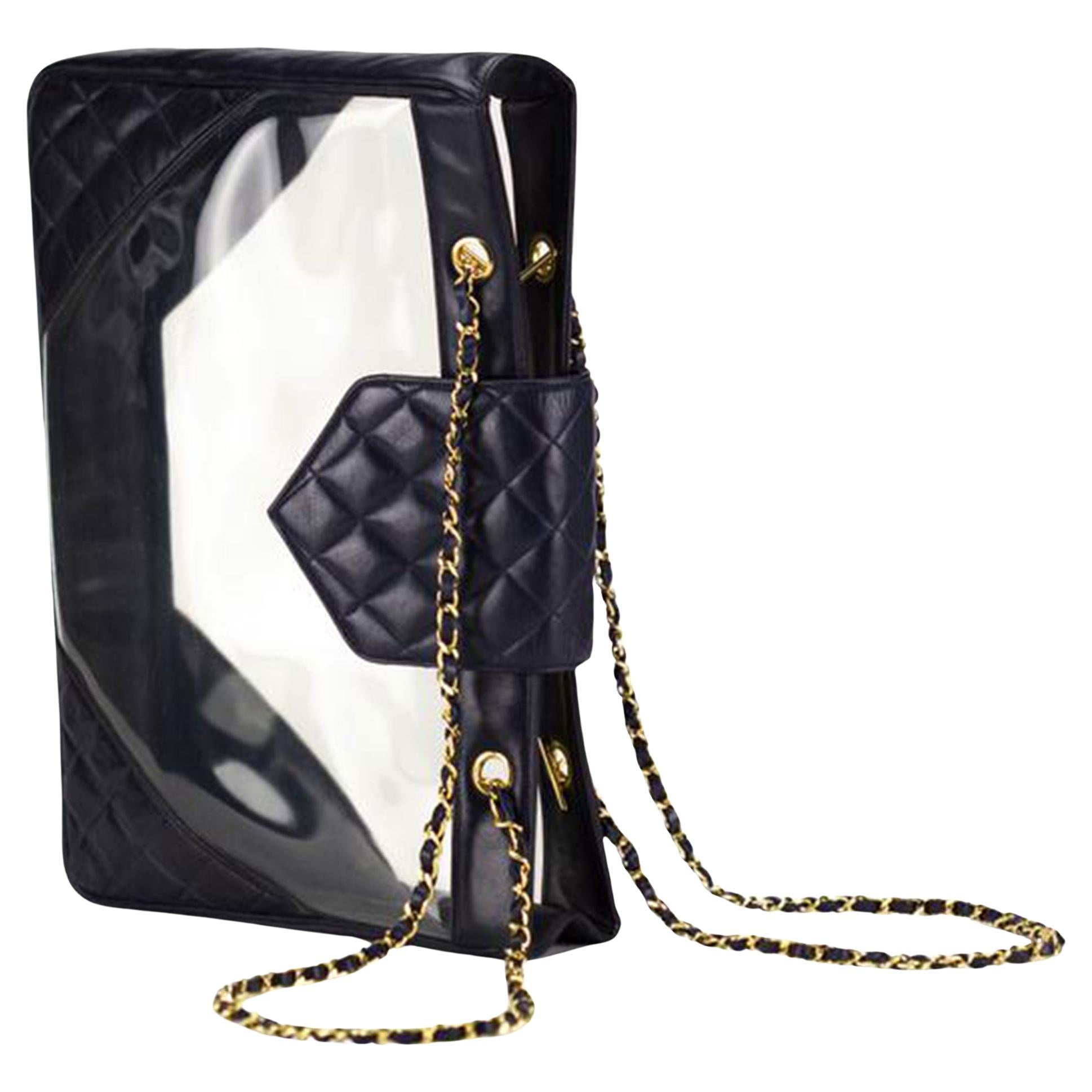 Chanel Transparent Clear Vintage PVC See Through XL Tote Shopping Tote

Year: 1990's {VINTAGE 25+ Years}

Gold hardware
Dark navy blue diamond quilted calfskin 
Clear sides made of transparent PVC
Classic interwoven chain and leather straps
Magnetic