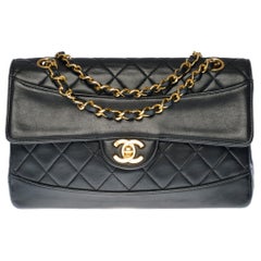 Chanel Timeless shoulder bag in black quilted leather with its wallet with GHW