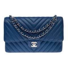 Chanel Timeless shoulder bag in blue chevrons quilted caviar leather , PHW