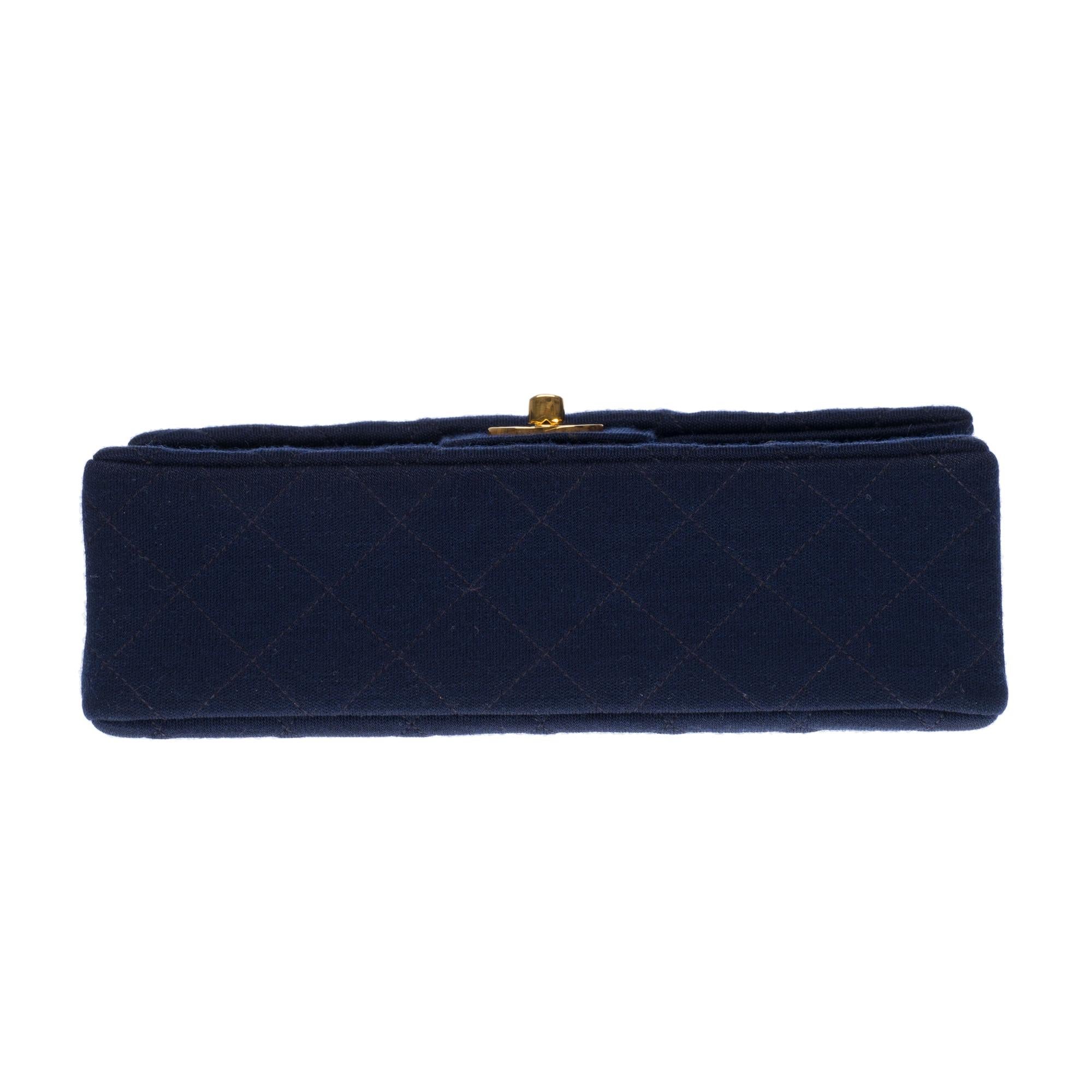 Chanel Timeless shoulder bag in navy blue quilted jersey with gold hardware 1