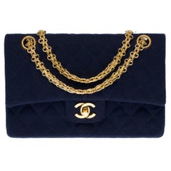 Chanel Timeless shoulder bag in navy blue quilted jersey with gold hardware
