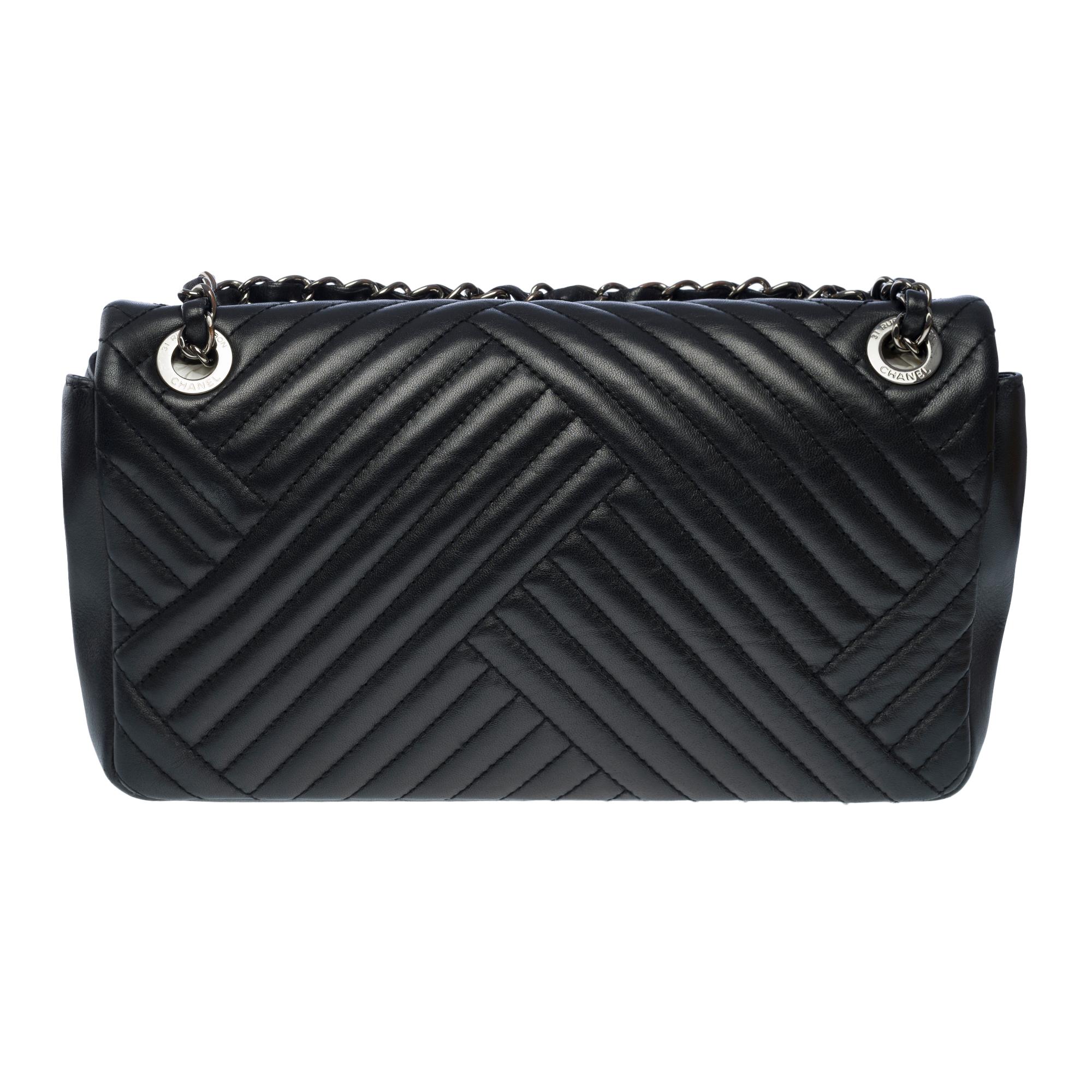 Chanel Timeless shoulder flap bag in black asymmetrical lambskin leather, RHW In Excellent Condition In Paris, IDF