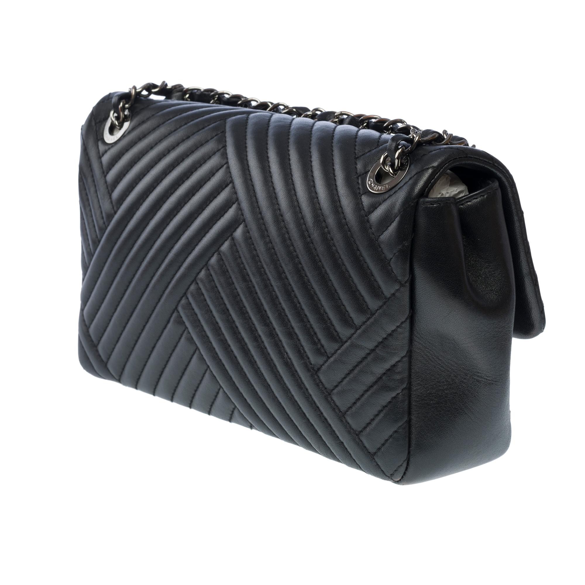 Chanel Timeless shoulder flap bag in black asymmetrical lambskin leather, RHW 1