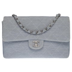 Chanel Timeless shoulder flap bag in blue quilted jersey with silver hardware
