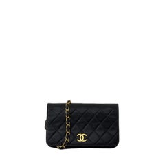 CHANEL Timeless WOC Mini Black Lambskin Leather Handbag 1997–1999