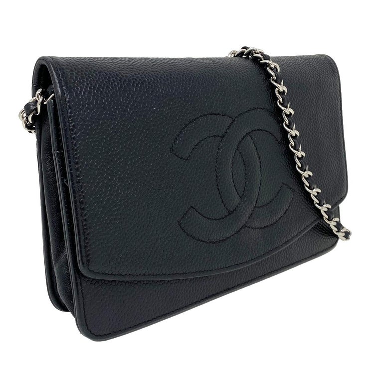 Company-Chanel
Style-Timeless WOC Wallet on Chain SHW Caviar Leather 
Outside -No rips, tears and marks - wear is consistent with age
Inside -Wear on lap and in interior- related to wear and age 
Pockets-5 Interior pockets- white marks inside them -