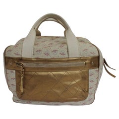 Chanel Toile- und Ledertasche