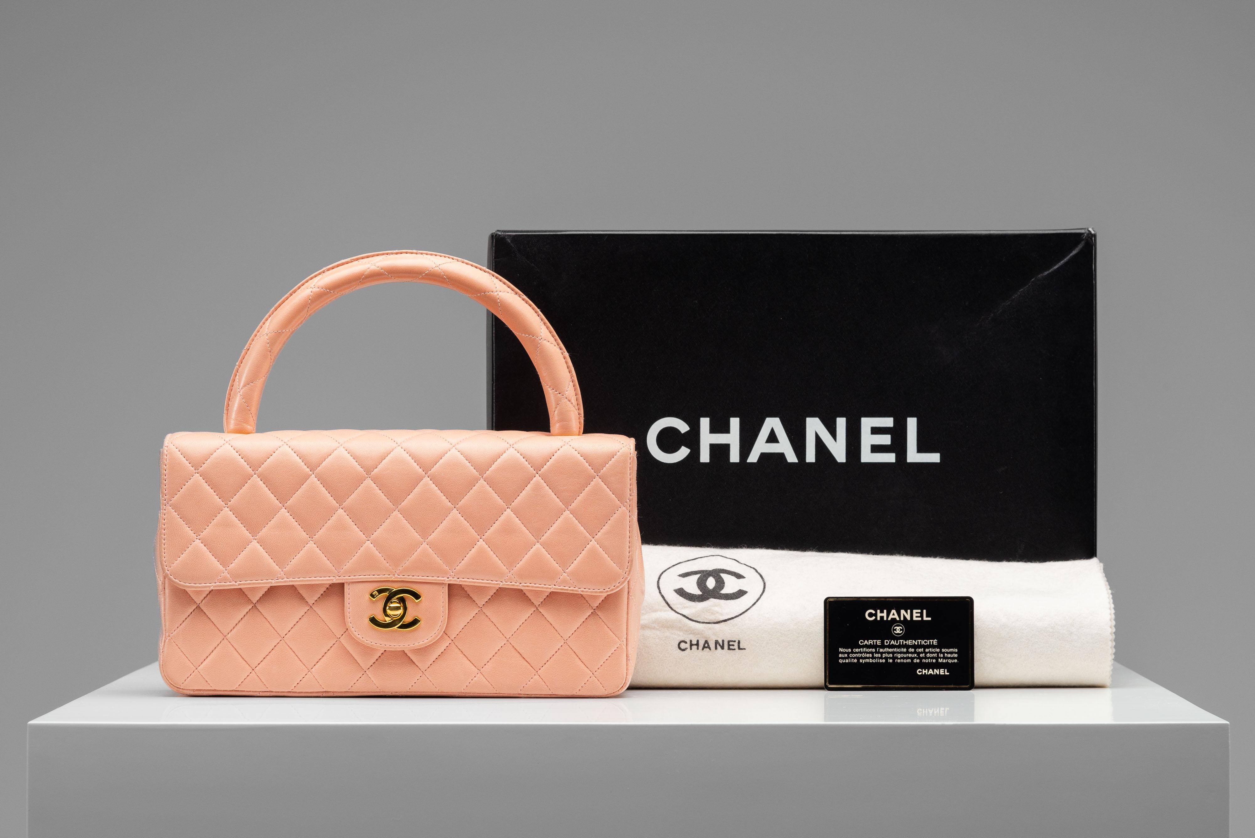 From the collection of SAVINETI we offer this Chanel Top Handle Bag:
-    Brand: Chanel
-    Model: Top Handle Bag
-    Color: Pink/ Peach
-    Year: 1994-1996
-    Serial number: 3285326
-    Condition: Very Good Original Condition 
-    Materials: