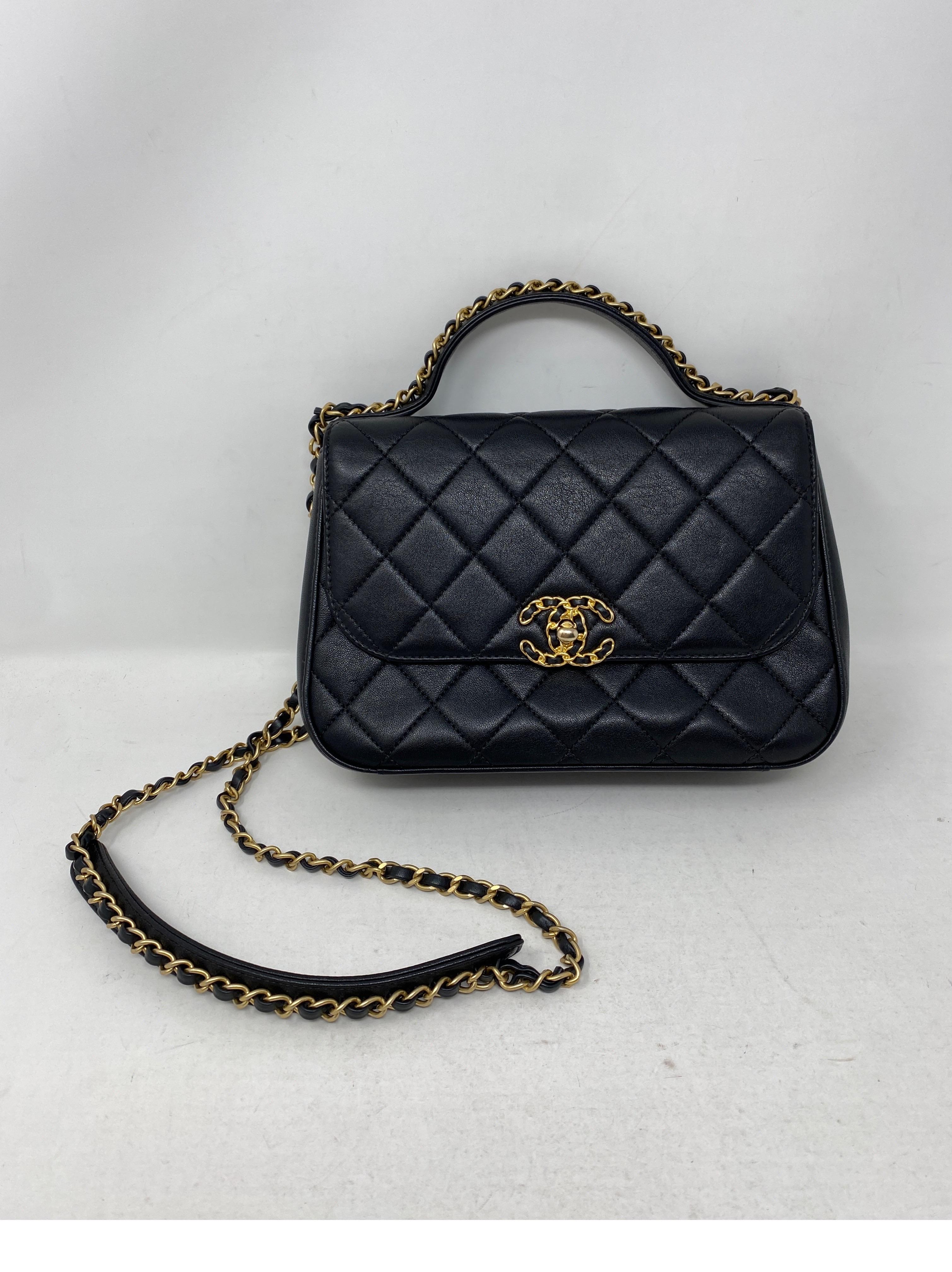 Chanel Top Handle Black Chain Bag. Crossbody bag. Beautiful black leather with gold chain details on top handle and CC lock closure. Excellent like new condition. Includes authenticity card. Guaranteed authentic. 