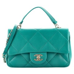Chanel Top Handle Flap Bag Gestepptes Lammfell Klein