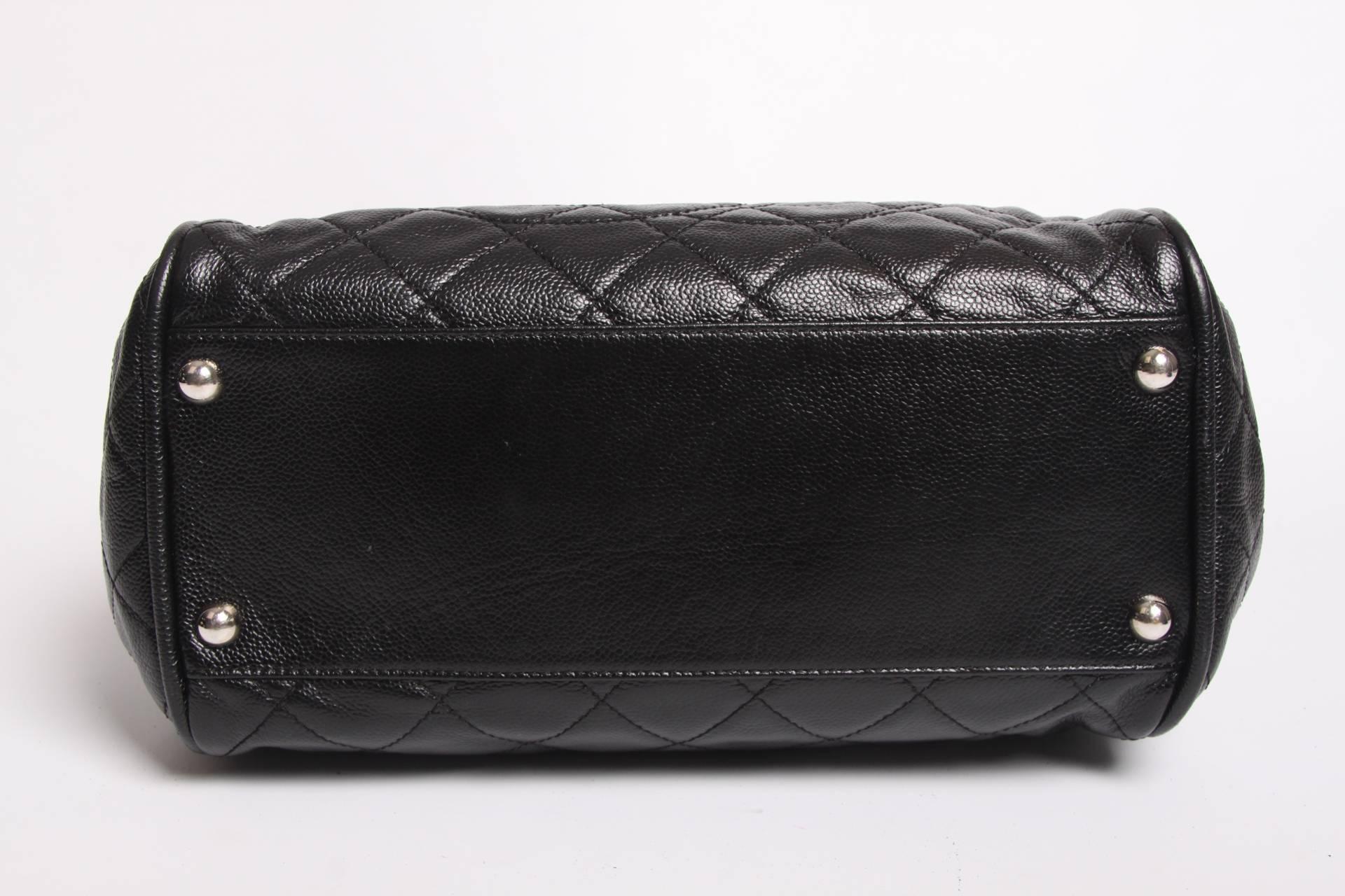 Chanel shopper in a rather large size, crafted in black caviar leather with silver-tone hardware. 

This bag is fully quilted and has a 2-way zipper on top for closures. At the front a large stitched interlocking CC logo. Two supple handles that