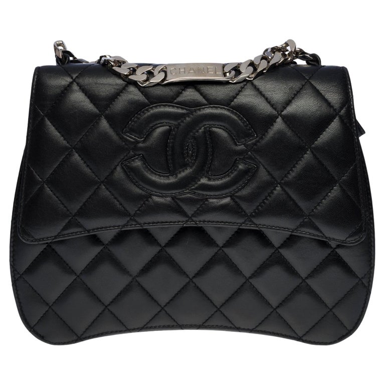 Chanel Trapezoidal flap bag in black quilted lambskin leather, SHW