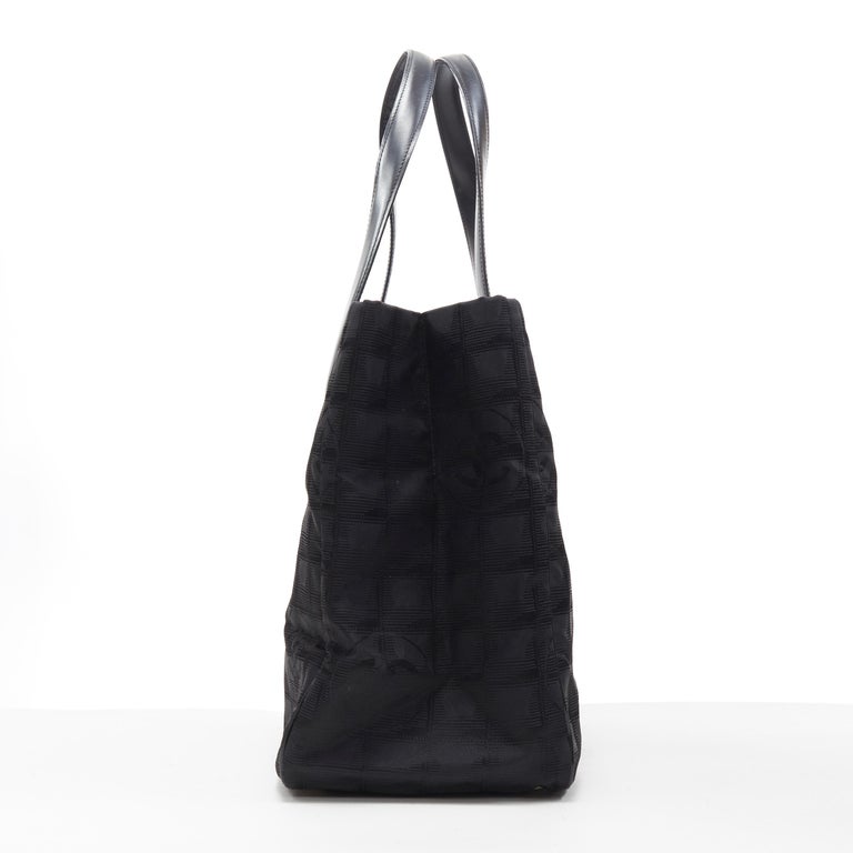 CHANEL Travel Ligne black checked CC jacquard fabric leather handle tote bag