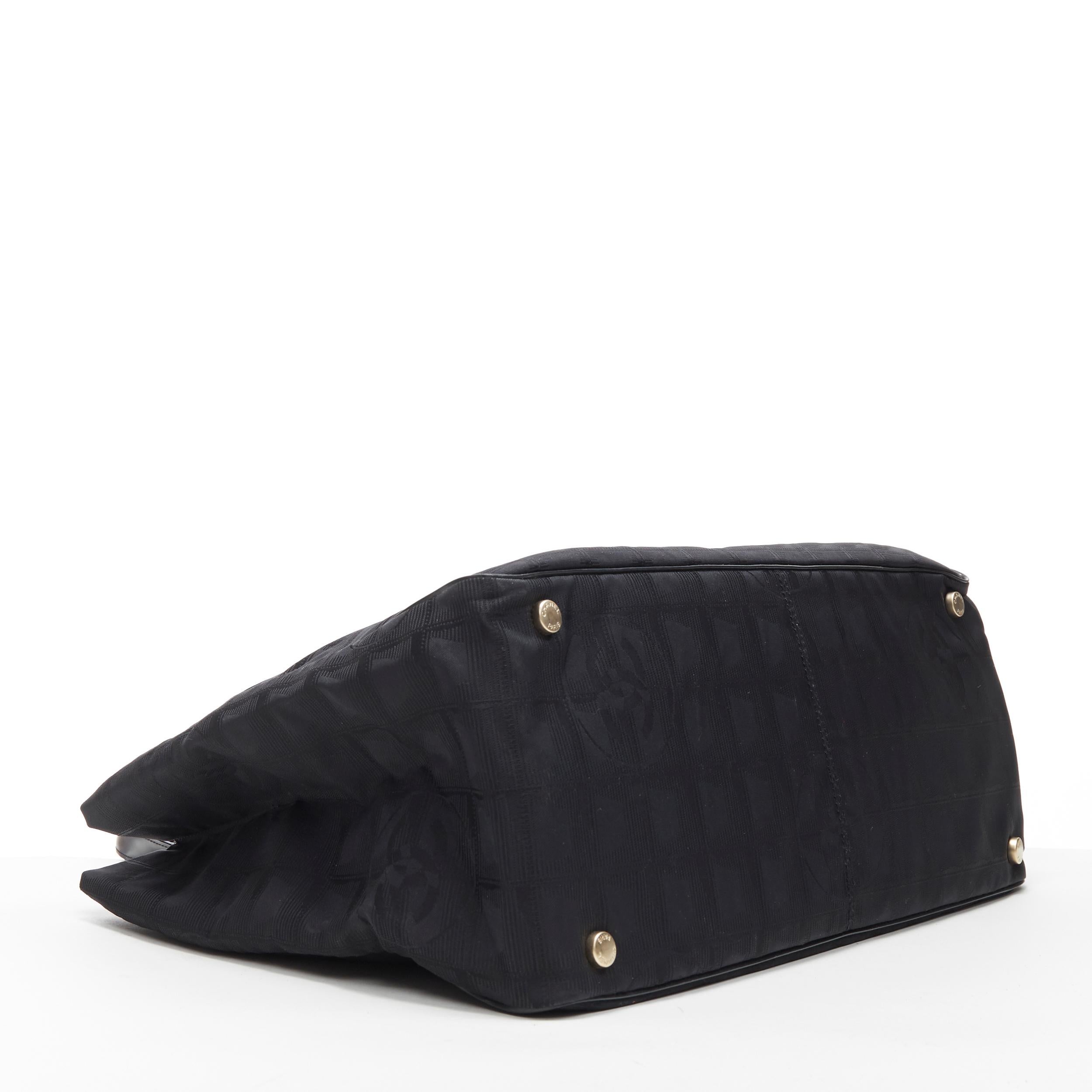 Black CHANEL Travel Ligne black checked CC jacquard fabric leather handle tote bag