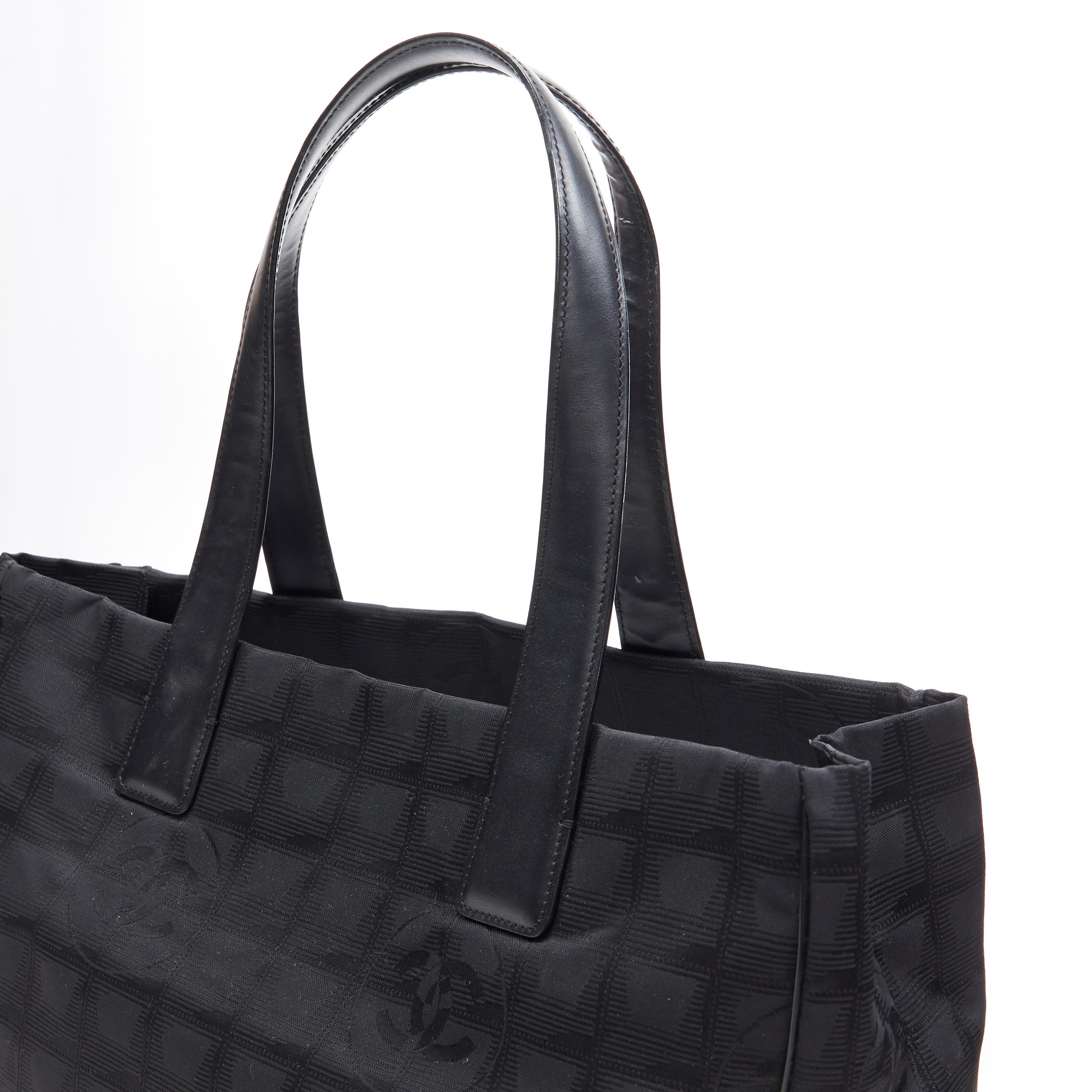 CHANEL Travel Ligne black checked CC jacquard fabric leather handle tote bag In Excellent Condition In Hong Kong, NT