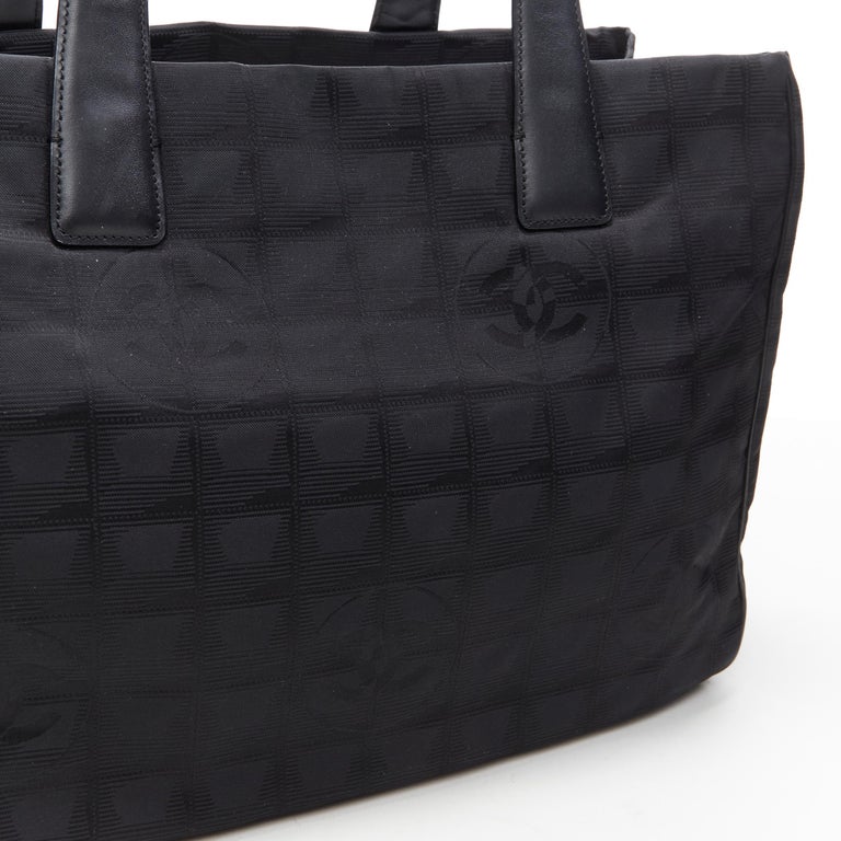 CHANEL Travel Ligne black checked CC jacquard fabric leather handle tote bag
