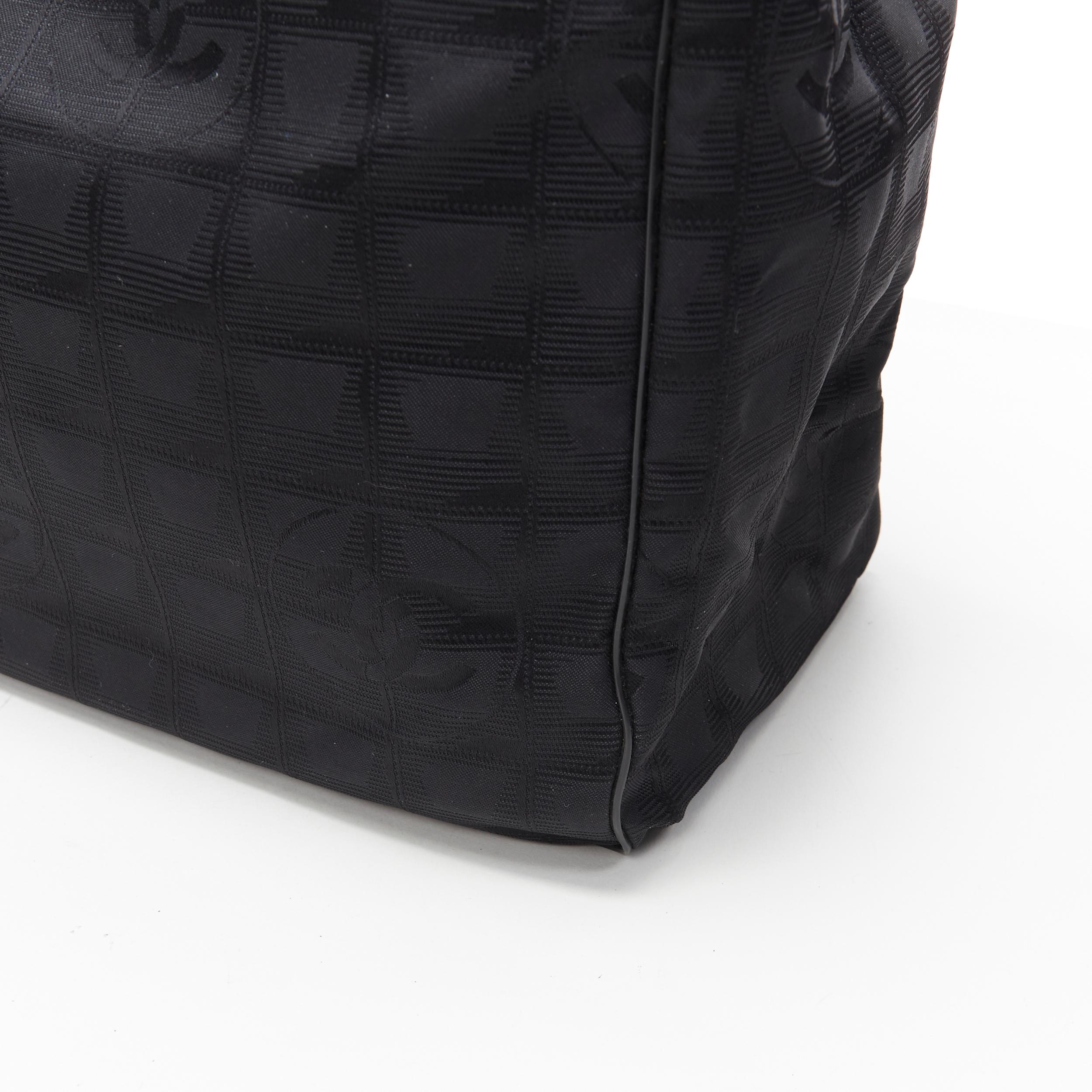CHANEL Travel Ligne black checked CC jacquard fabric leather handle tote bag 1